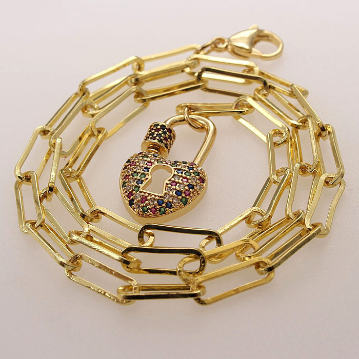 Moderner Stil, herzförmiges Schloss, Kupferbeschichtung, Inlay, Zirkon, vergoldete Armbänder, Halskette