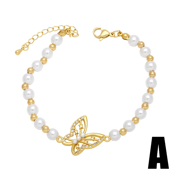 Süße Schmetterlings-Imitationsperlen-Kupfer-Perlenüberzug-Inlay-Zirkon-Armbänder mit 18-Karat-Vergoldung