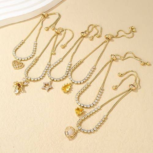 Bracelets plaqués or Zircon incrustés de cuivre de fleur de forme de coeur élégant et luxueux