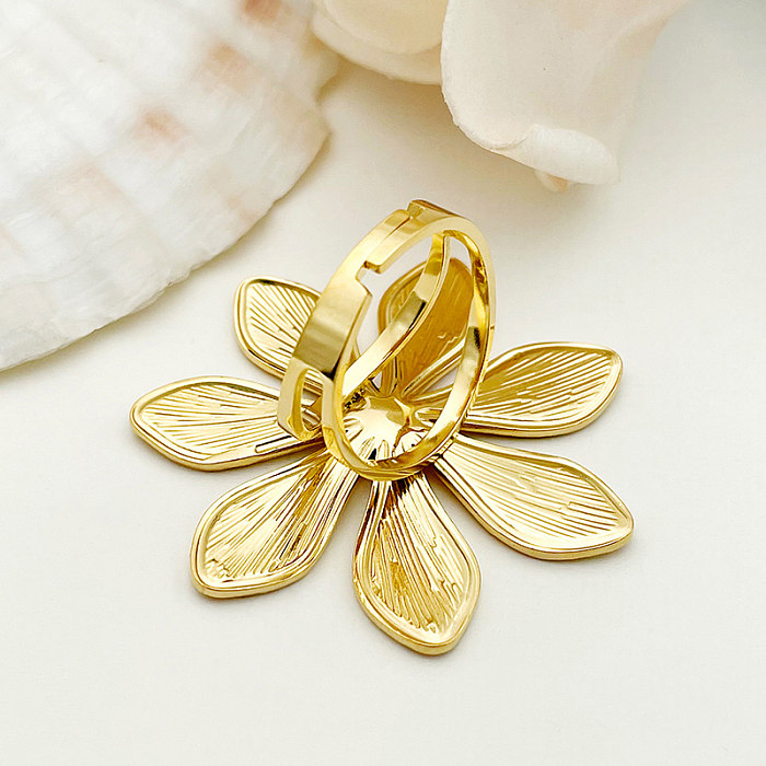Anillos abiertos chapados en oro con revestimiento de acero inoxidable y flor dulce elegante