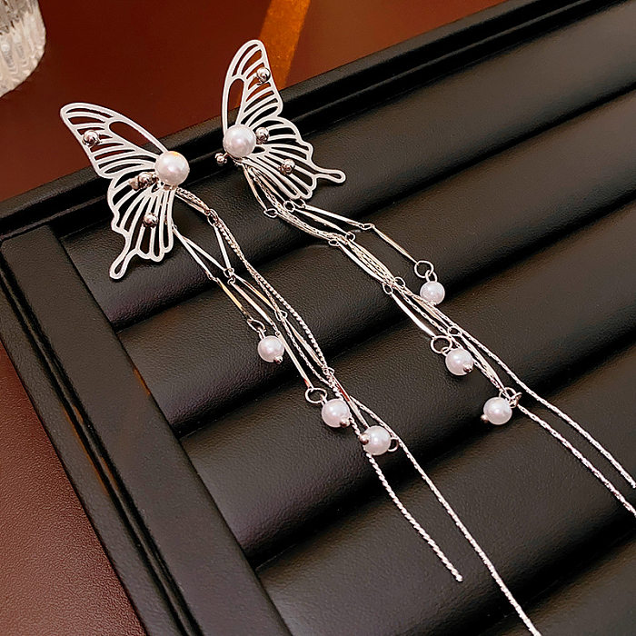 1 paire de boucles d'oreilles pendantes en cuivre, style streetwear moderne, papillon
