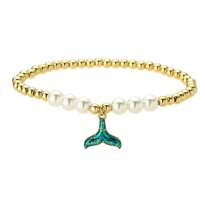 Pulseras chapadas en oro con incrustaciones de perlas de cobre y cola de pez de estrella de mar de playa
