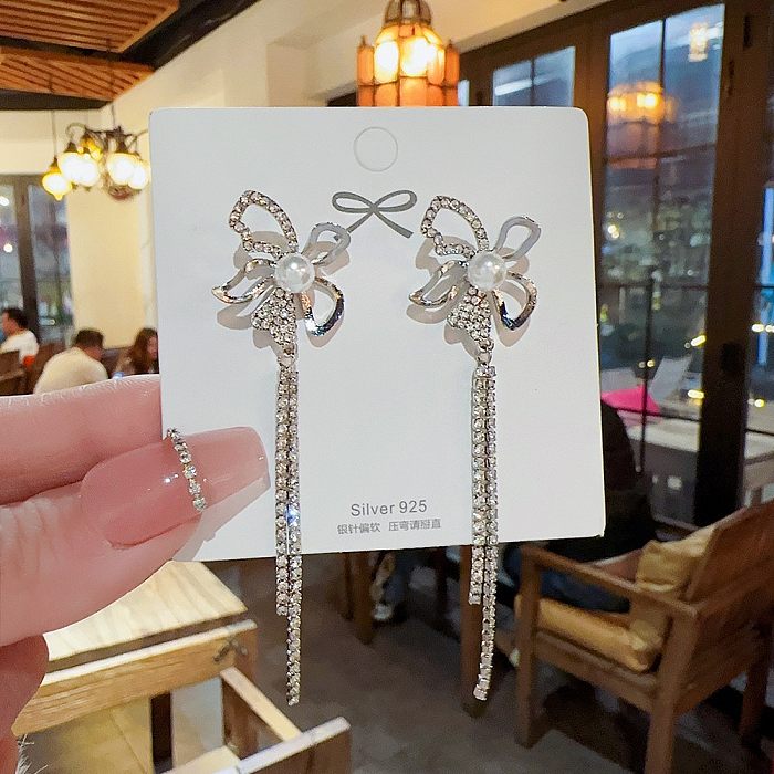 1 par estilo fada estilo coreano formato de coração borboleta nó cobre borla incrustação brincos de gota de zircônia