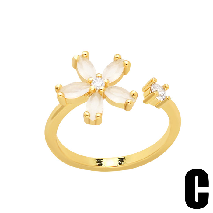 Einfacher, offener Ring mit Blumenkupfer und vergoldetem Zirkon, 1 Stück