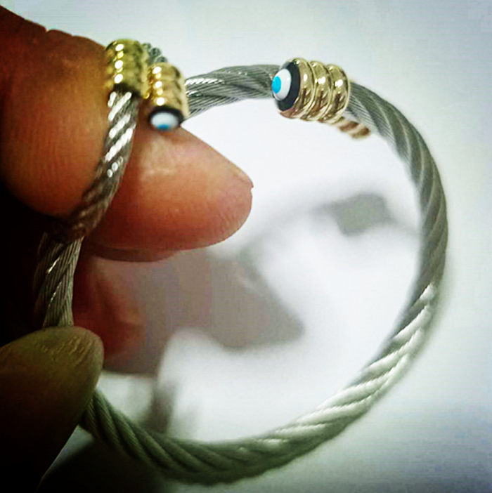 Pulseras de anillos de cobre de acero inoxidable con ojo de diablo retro básico