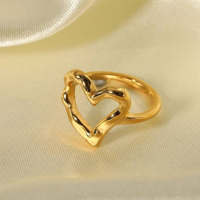 Anéis folheados a ouro 18K de aço inoxidável da forma simples doce do coração do estilo no volume