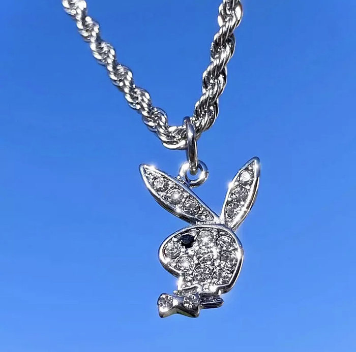 Collar de pendientes de diamantes de imitación con incrustaciones de acero inoxidable de conejo de estilo simple