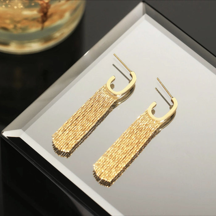 1 paire de boucles d'oreilles pendantes avec chaîne en cuivre et pampilles de Style Simple