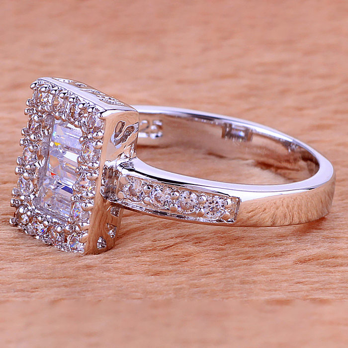 Elegantes anillos de circón con incrustaciones de cobre cuadrado redondo glamoroso
