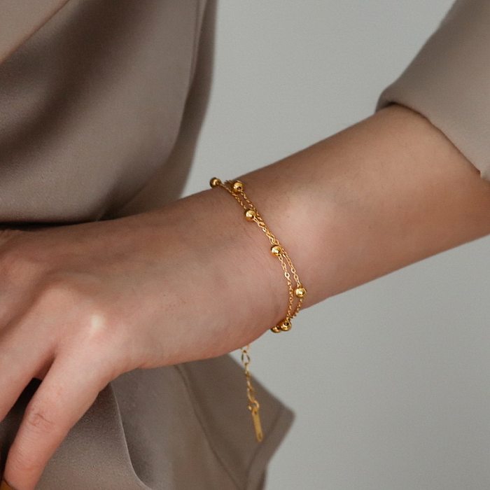 Collar de pulseras chapado en oro de 18 quilates con revestimiento de acero de titanio de color sólido dulce