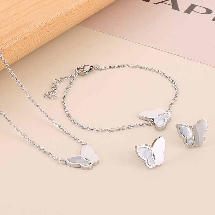 Collar de pendientes de pulseras de concha con incrustaciones de acero de titanio de mariposa brillante de estilo Simple