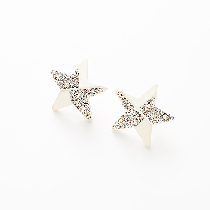 1 paire de boucles d'oreilles pendantes en cuivre et zircon plaqué or 18 carats avec incrustation d'étoile de style simple Glam