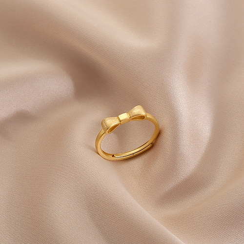 Anéis abertos de cobre com nó de arco de deslocamento básico