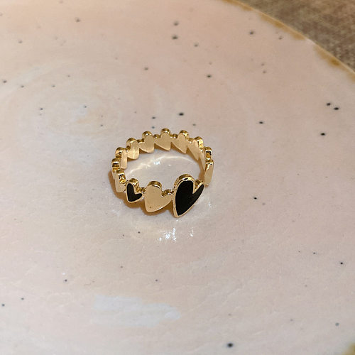 O estilo simples elegante acena o anel aberto do cobre da flor da forma do coração no volume