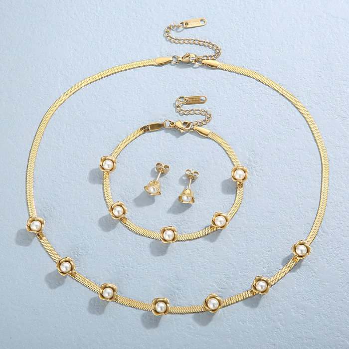 Casual Vacation Geometrische Titanstahlbeschichtung mit 18 Karat vergoldeten Armbändern, Ohrringen und Halsketten