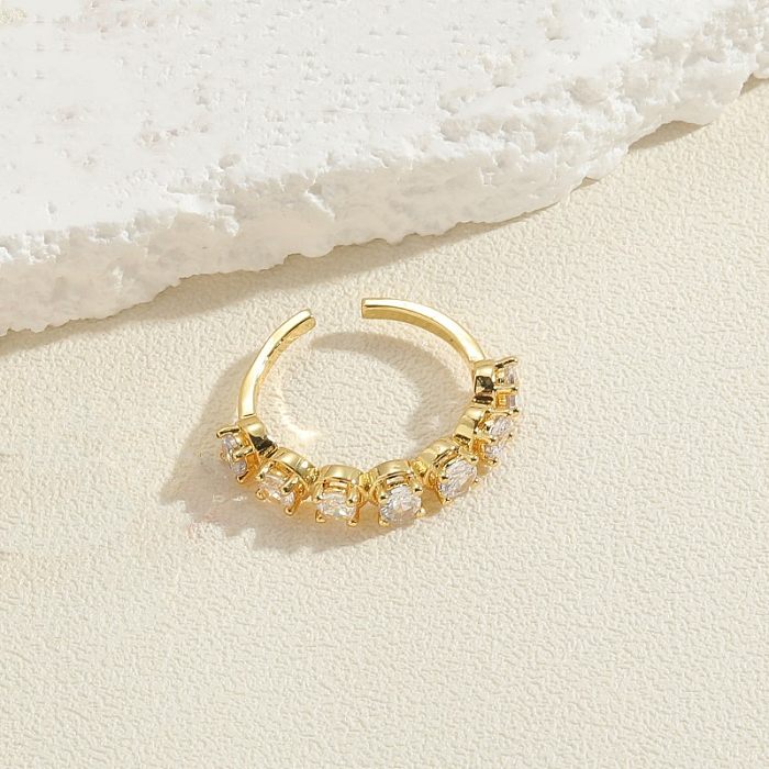 Elegante, runde, mit 14-karätigem Gold plattierte Ringe mit Zirkoneinlage und Kupferbeschichtung