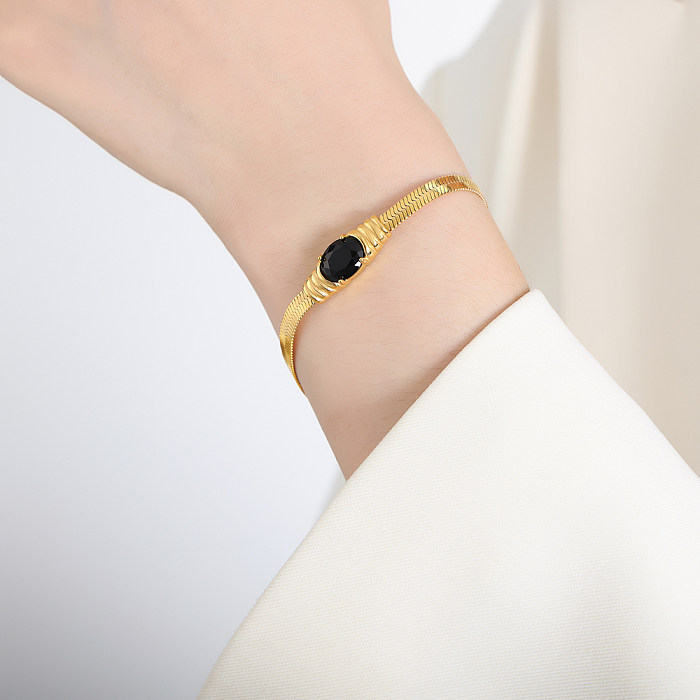 Elegante, luxuriöse Halskette mit geometrischem Titanstahlüberzug und 18 Karat vergoldetem Armband