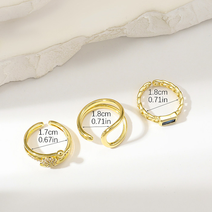 Offene Ringe im modernen Stil mit Twist-Kupferbeschichtung und Zirkoneinlage, 18 Karat vergoldet