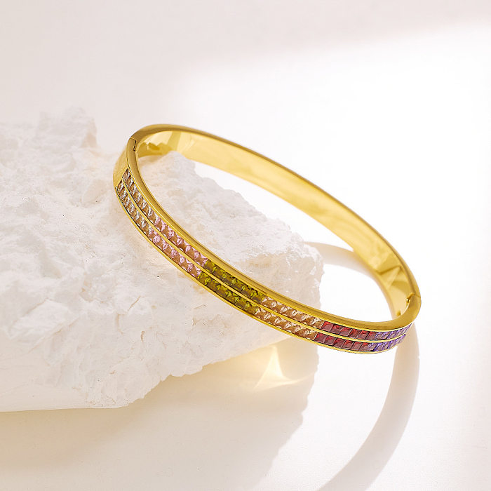 Pulseras de anillos chapadas en oro de 18 quilates con incrustaciones de acero de titanio redondo casual