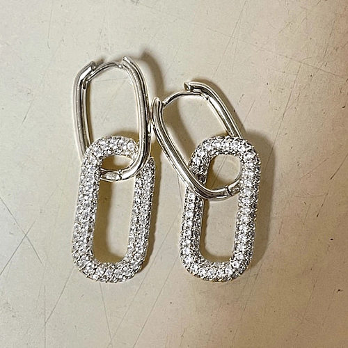 1 paire de boucles d'oreilles pendantes en Zircon avec incrustation de cuivre géométrique de Style classique de base