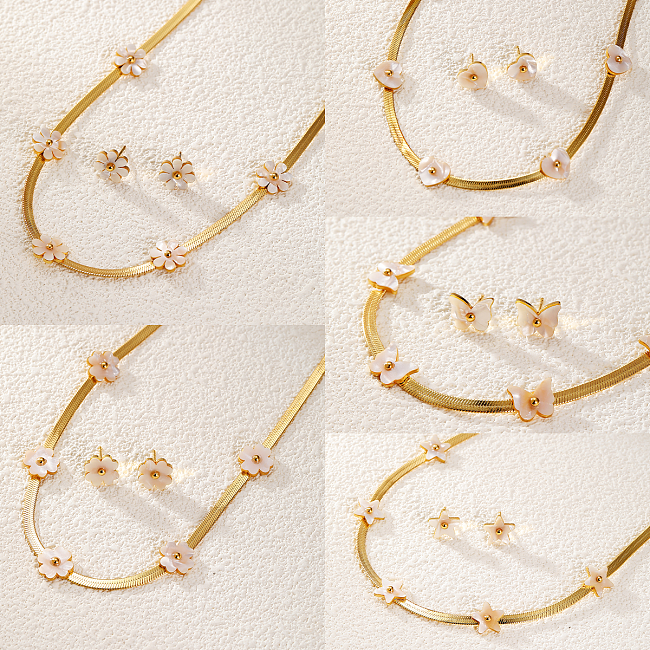 Elegante schlichte Ohrringe mit Stern- und Herzform-Blume-Edelstahl-Muschelbeschichtung, 18 Karat vergoldet