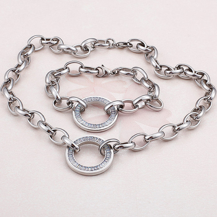 Conjunto de collares y pulsera de diamantes con incrustaciones redondas de acero inoxidable