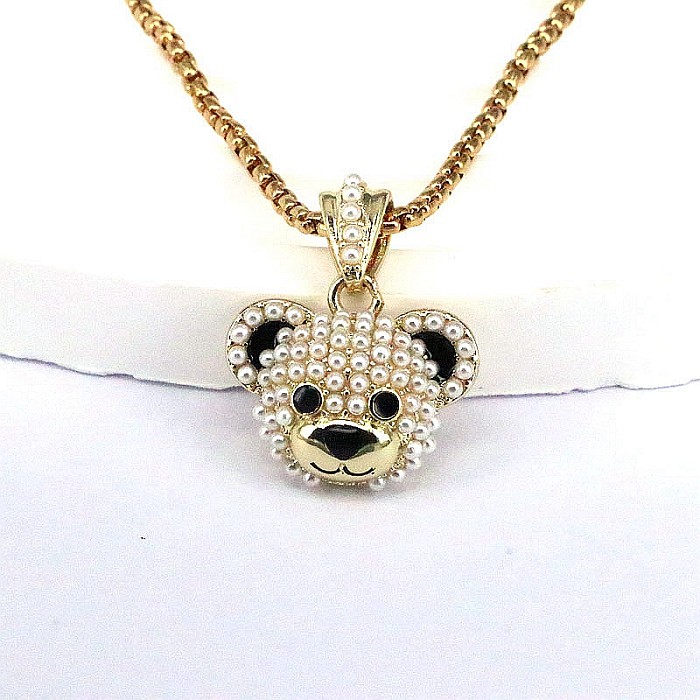 Modische kleine Bären-Anhänger-Halskette mit Kupferbeschichtung und Inlay-Perlenvergoldung