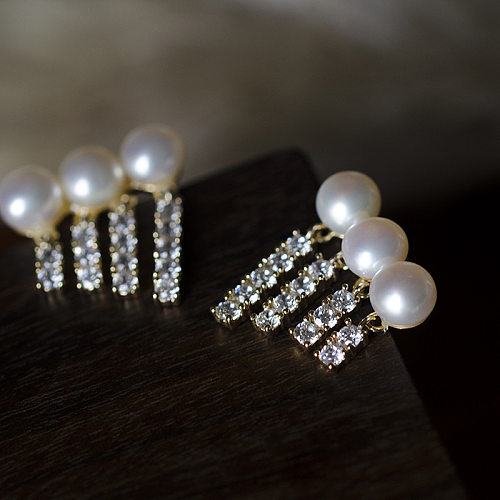 1 par de pendientes de circonita con perlas artificiales de cobre con incrustaciones de borlas para mujer