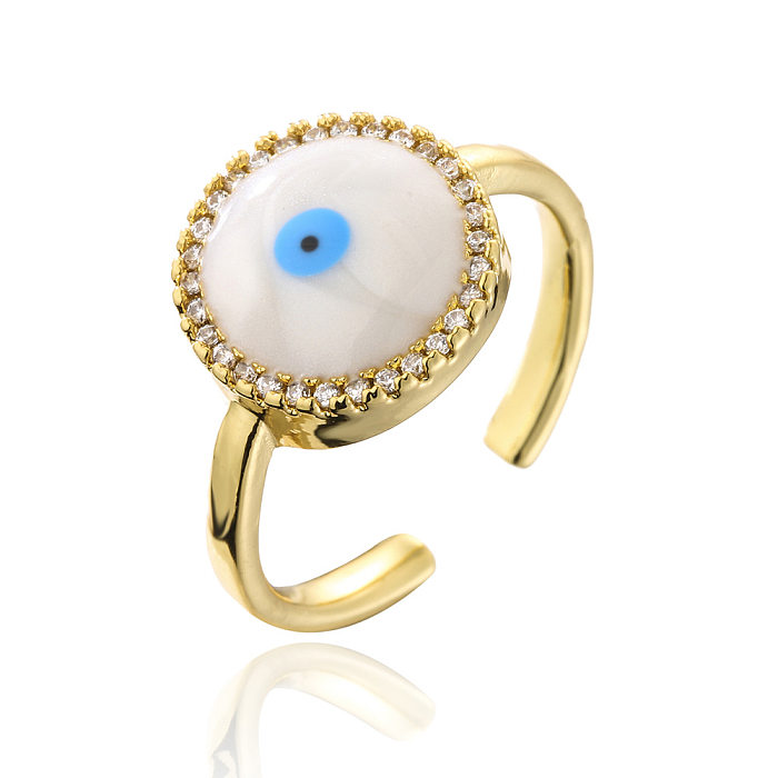 Moda 18K oro goteo aceite circón ojo del diablo cobre geométrico anillo abierto femenino