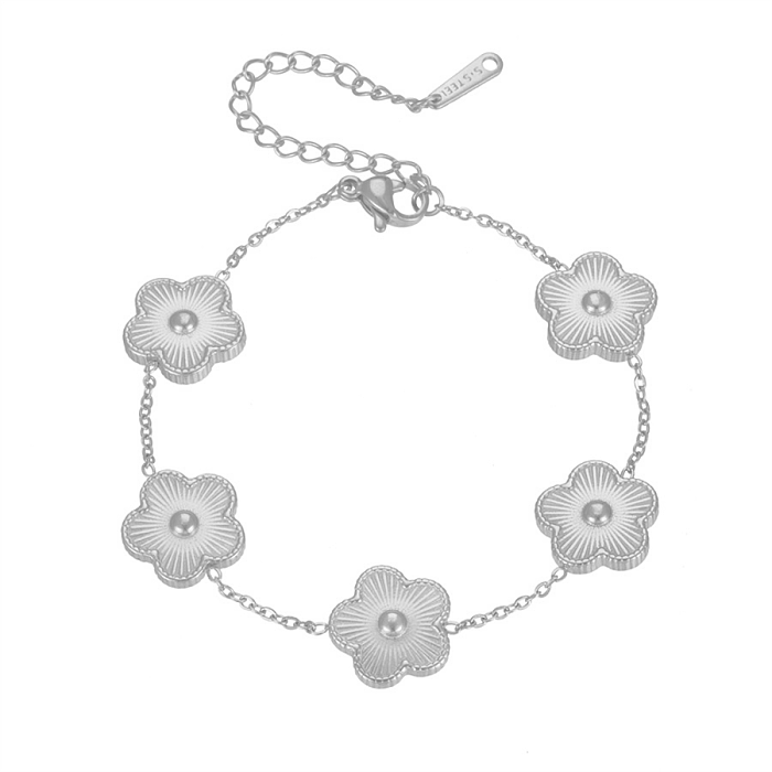 Collar de pendientes de piedras preciosas artificiales con incrustaciones de acero de titanio y flores de estilo simple retro