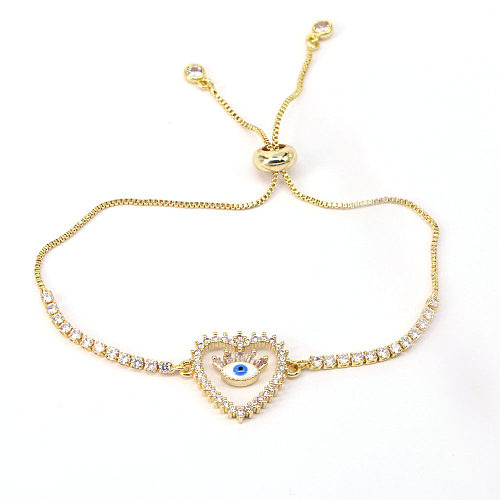 Moda em forma de coração cobre 18k banhado a ouro micro incrustado zircão pulseira de mau olhado