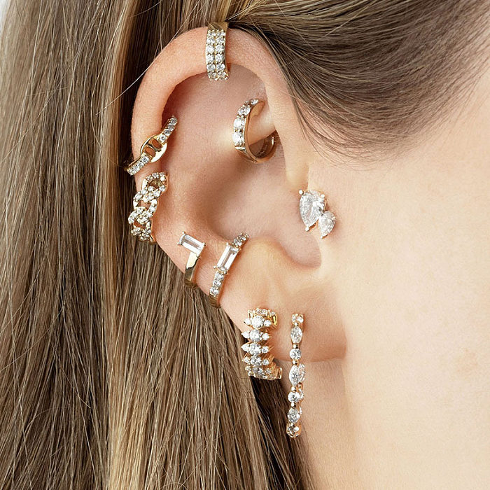 Einfache Ohrringe mit Zirkon-Ohrclip und unregelmäßiger geometrischer Einlage aus Gold und Kupfer