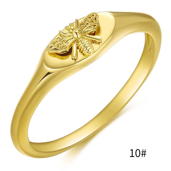 Elegantes anillos chapados en oro con revestimiento de cobre y abeja