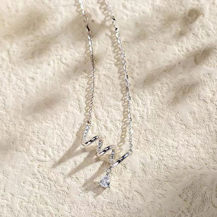 Collar de diamantes de imitación con incrustaciones de cobre chapado en gotas de agua curvas de estilo simple estilo IG
