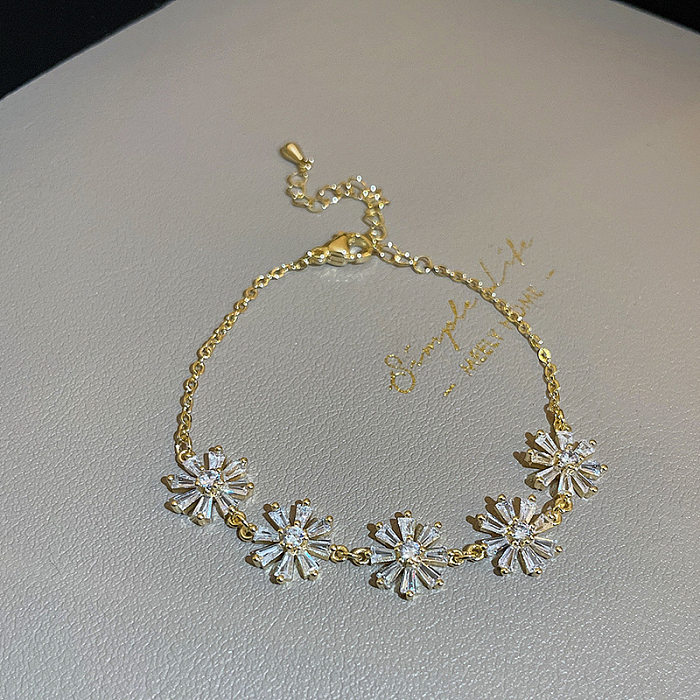 INS-Stil runde herzförmige Blumen-Kupfer-Zirkon-Armbänder in großen Mengen