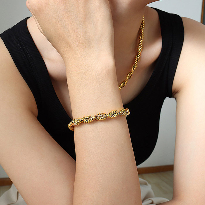 Collier de bracelets des femmes de placage d'acier de titane de torsion de style simple