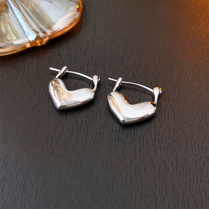 1 paire de boucles d'oreilles en cuivre plaqué en forme de cœur, Style Simple et décontracté