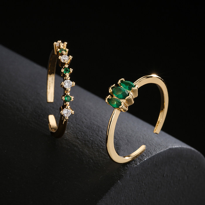 Modischer, schlichter, offener, verstellbarer Ring mit 18-karätigem Goldüberzug und Mikro-Intarsien aus grünem Zirkon