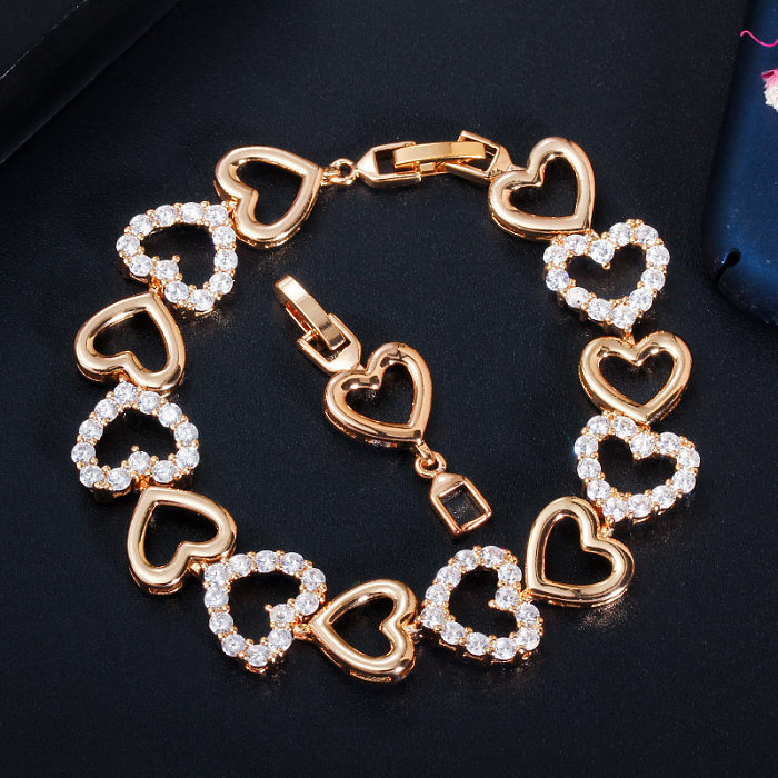 Bracelets plaqués or en Zircon avec incrustation creuse en laiton en forme de cœur élégant