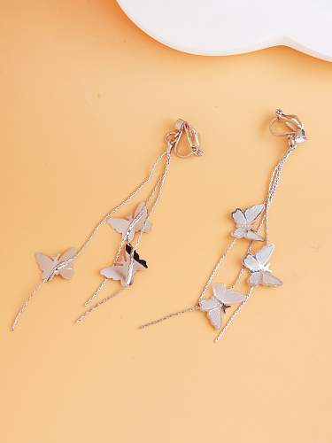 1 paire de boucles d'oreilles pendantes en cuivre, Style Simple, couleur unie, incrustation de papillon