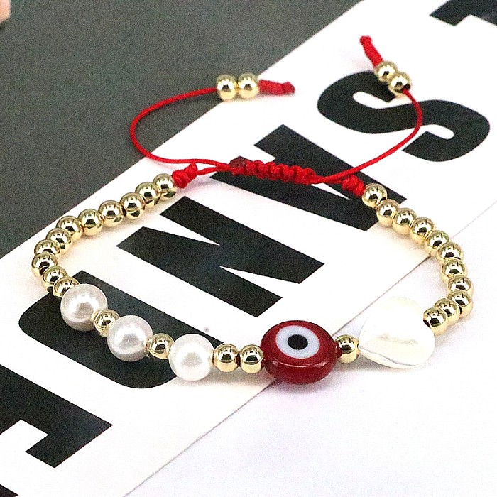 Hip-Hop redondo forma de corazón ojo imitación perla cuerda cobre con cuentas chapado en oro pulseras de concha 1 pieza