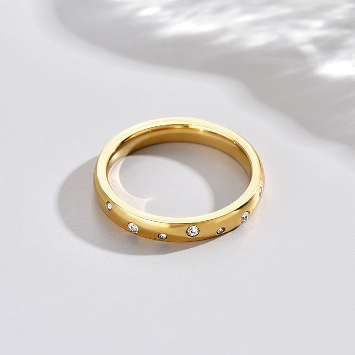 Anillos de diamantes artificiales chapados en oro de acero inoxidable 14K con círculo elegante al por mayor