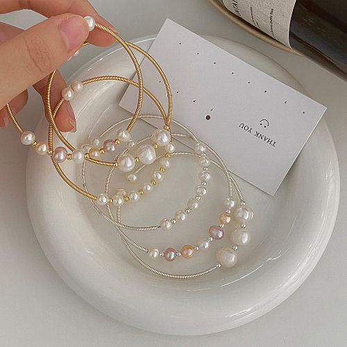 Bracelet en cuivre avec perles d'eau douce de couleur unie de base
