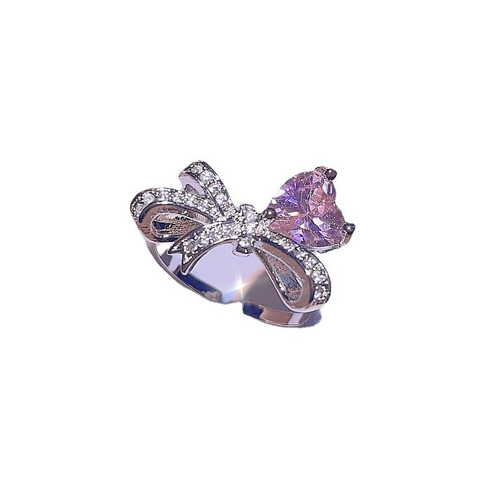 Collier élégant avec nœud papillon et acier titane, incrustation de Zircon, anneaux, boucles d'oreilles