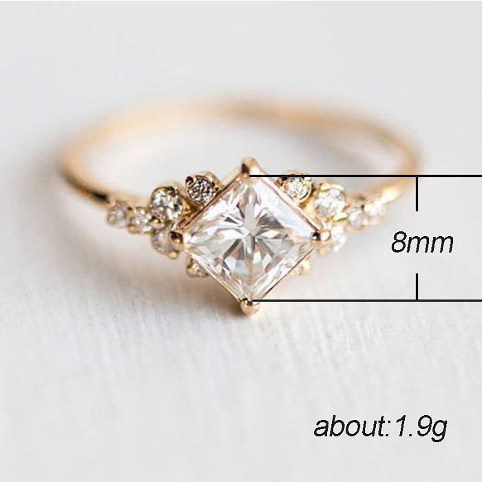 Neuer eingelegter quadratischer Diamant-Zirkon-Damenring, Kupfer-vergoldeter Verlobungsring