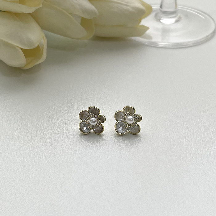 1 Paar elegante herzförmige Blumen-Schleifenknoten-Überzug-Inlay-Kupfer-Strasssteine, versilberte Ohrringe