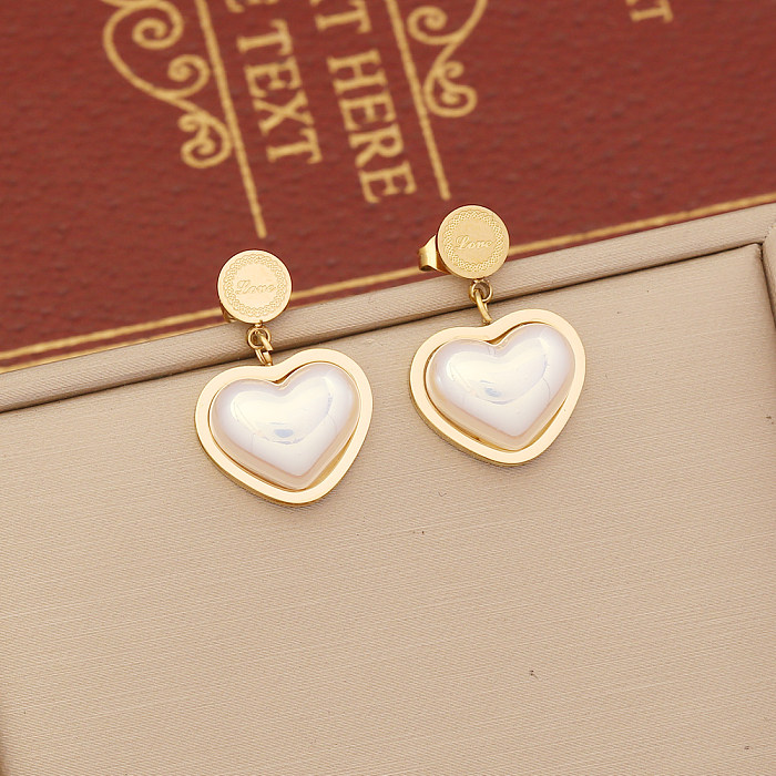 Venta al por mayor elegante collar de pendientes de pulseras de perlas de acero inoxidable con forma de corazón
