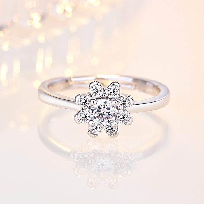 As pedras preciosas artificiais do embutimento simples do cobre da flor do estilo abrem anéis