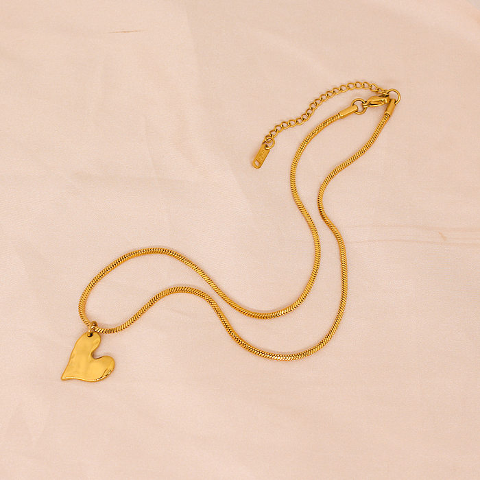 Einfache, klassische Herzform-Ohrring-Halskette mit Titanstahlbeschichtung