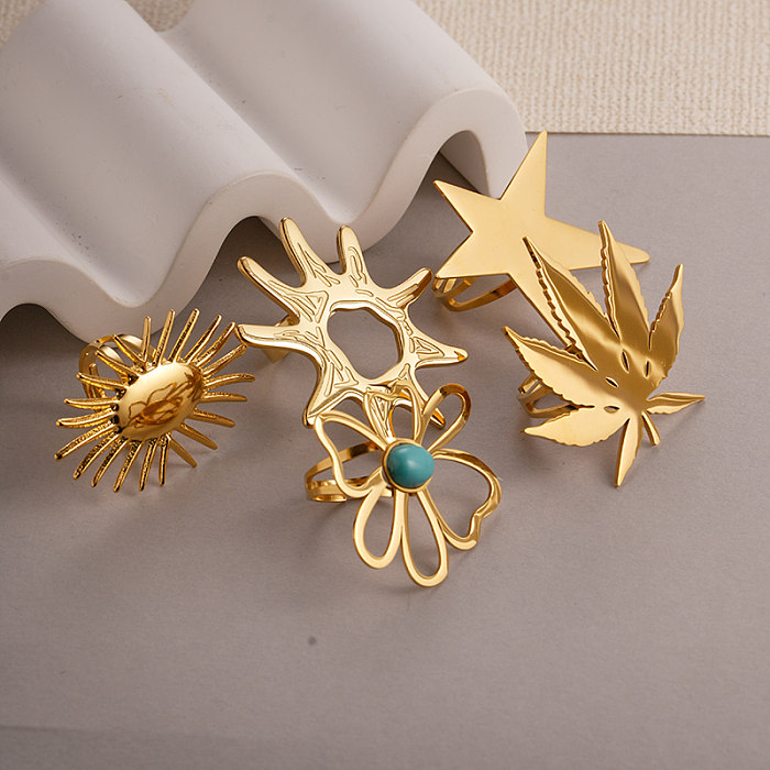 Anillos chapados en oro de circón con incrustaciones de acero inoxidable con flor de pentagrama pastoral de estilo moderno exagerado